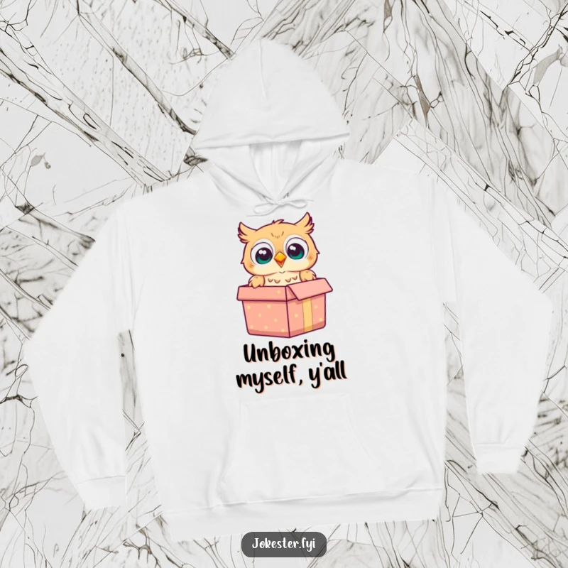 Funny owl hoodie featuring a cheerful owl emerging surprisingly from a gift box, perfect for warmth.