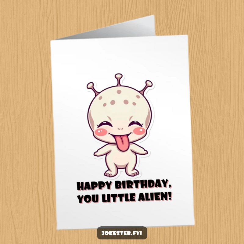 Funny Free Printable Birthday Card: A silly alien character giggling with its tongue sticking out playfully.